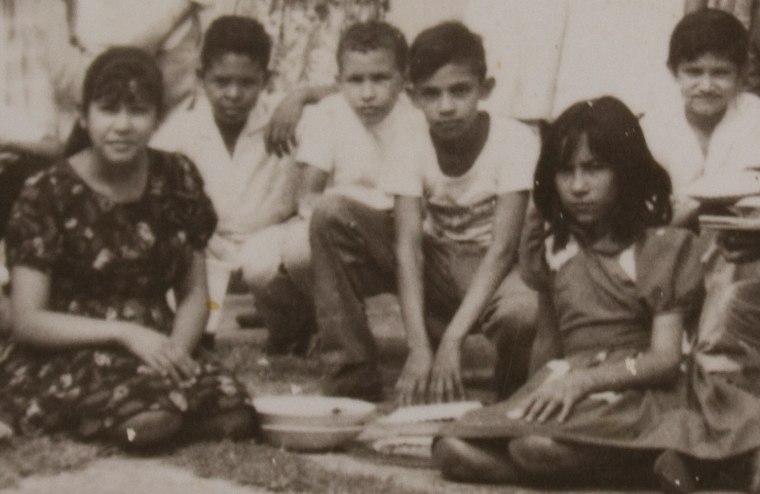 Image: Undated handout photo showing Hugo Chavez posing with classmates
